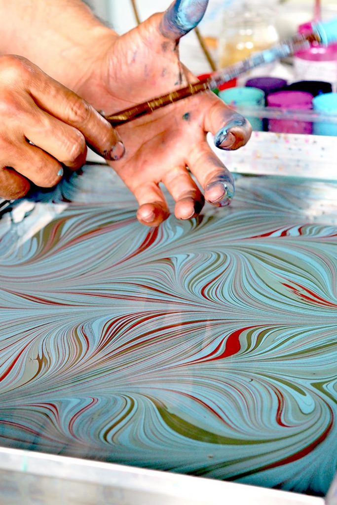 turquoise red ebru marbled pattern